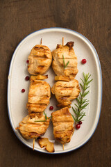 Chicken kebab with spices and lingonberry, top view