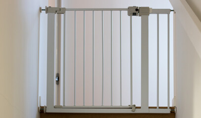 Child safety gate at home; childhood concepts