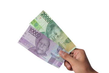 hand showing 10,000 and 20,000 rupiah isolated on white background