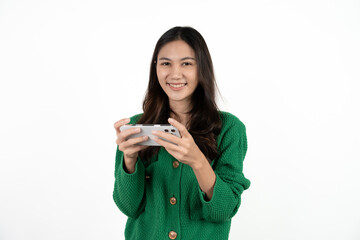 Happy asian woman feeling happiness and standing typing smartphone on white background.