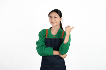 Small shop owner, entrepreneur or sales clerk standing happy and proud wearing apron. Young woman...