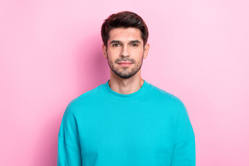 Photo portrait of attractive young man calm confident look camera shopping dressed stylish blue outfit isolated on pink color background