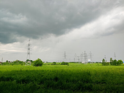 Thunderstorm over industrial landscape