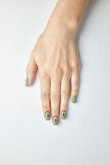 female manicure on a white background. nail. nails. Women's hands with a beautiful manicure on a white background. Beautiful female hands on a light background. Take care of your hand.