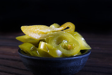 spicy tex-mex jalapeno pepper isolated on black background