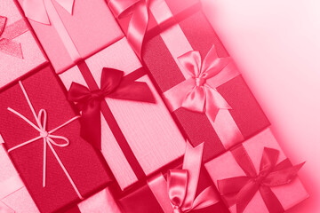 Gift boxes on pink background. Birthday, Christmas or Valentines day concept. Top view, flat lay