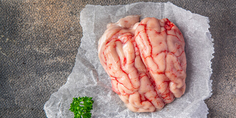 raw brain pork offal fresh meat meal food snack on the table copy space food background rustic top...
