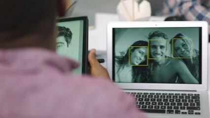 Facial recognition software, tablet and business people in meeting or engineers developing app for mobile technology. Teamwork, graphic designers and group in office sharing ideas and brainstorming. - Powered by Adobe