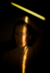 woman between light and shadows