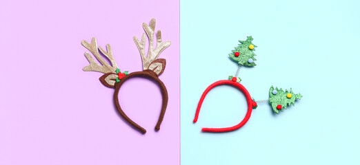 Funny Christmas headbands on color background