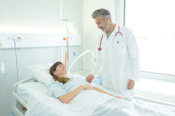 Fototapeta premium doctor visiting the recovering patient