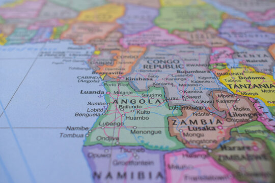 Angola Travel Concept Country Name On The Political World Map Very Macro Close-Up View Stock Photograph