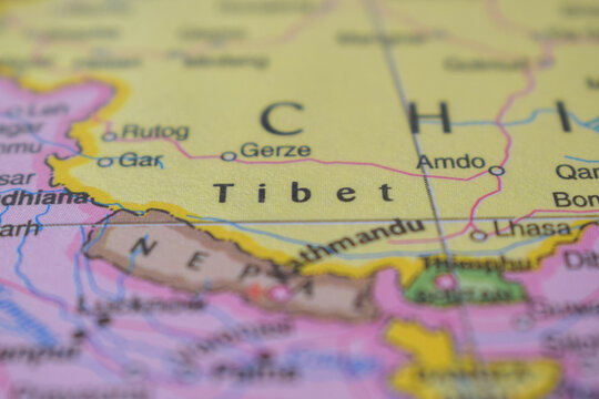 Tibet Travel Concept Country Name On The Political World Map Very Macro Close-Up View Stock Photograph