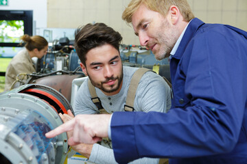 young workers working in furniture factory