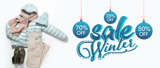 Banner for winter sale with warm clothes on white background
