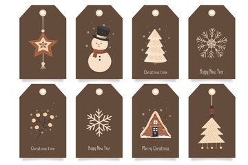 A large set of different New Year's Christmas tags, labels with a Christmas tree, a pendant, a house, a snowman, a snowflake, a mountain ash in natural shades. Eco decoration.