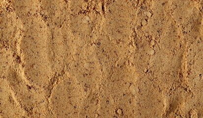 Unrefined brown cane sugar pile background and texture