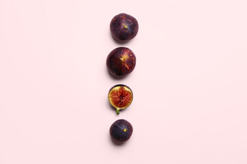 Fresh figs on pink background