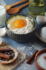 Food ingredients for baking: flour, eggs, milk, sugar	