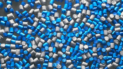 Close up picture of color masterbatch pellets, selective focus.