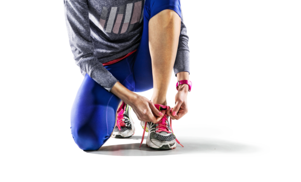 Sports transparent background. A young female runner is ready for a workout in her sports shoes.	