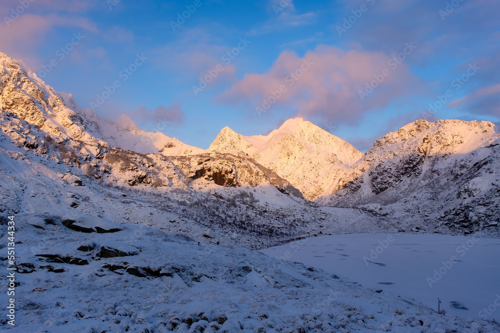 Poster north. winter landscape during sunset. bright sky. mountain peaks during sunset. snowy winter. natur