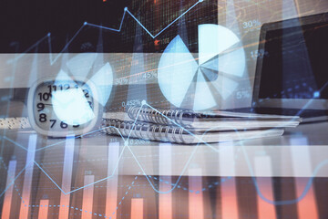 Forex Chart hologram on table with computer background. Multi exposure. Concept of financial markets.