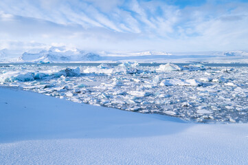 Fototapeta na wymiar Iceland. Ice as a background. Vatnajokull National Park. Panoramic view of the ice lagoon. Winter landscapes in Iceland. Natural background. North country.