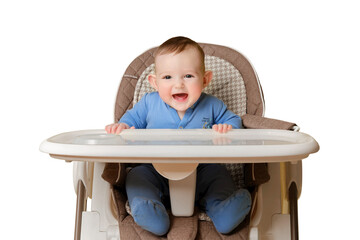 Happy baby sits on a high chair for feeding children, isolated on a white background. Smiling child boy at the age of six months eating while sitting on a high chair, copy space - obrazy, fototapety, plakaty