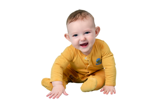 Happy toddler baby plays laughing, isolated on a white background. Funny child boy at the age of six months sits and smiling, copy space