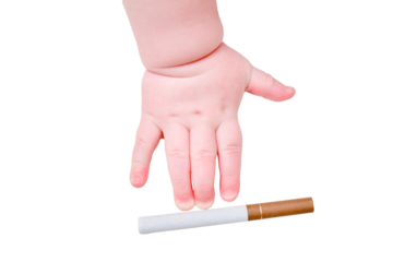 Baby hand and cigarette with tobacco, close-up, isolated on a white background. Children fingers and an object on a white background