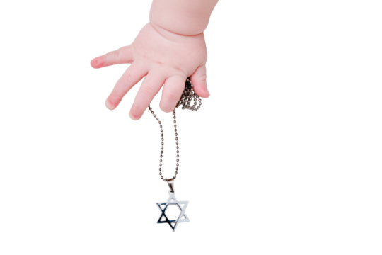 Baby hand and Jewish religious symbol is the star of David, close-up, isolated on a white background. Children fingers and an object on a white background
