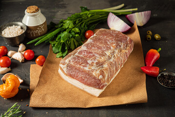 Homemade Chunks of salted bacon, pork lard, close-up