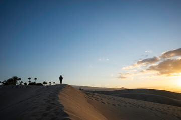 Fototapeta na wymiar Sunrise in sand dunes with nice colors