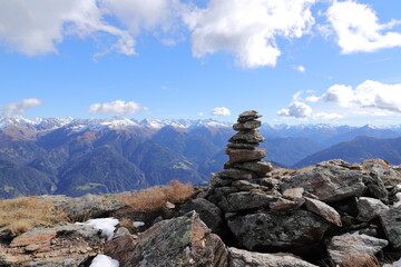a stone pyramid on the top of the alps in tirol