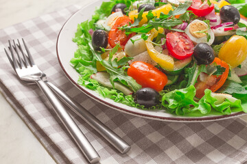 Vegetable salad , with quail eggs and olives, fresh, close-up, no people,