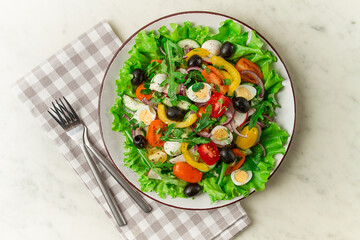 Vegetable salad , with quail eggs and olives, fresh, close-up, no people,