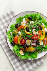 Vegetable salad , with quail eggs and olives, fresh, close-up, no people,
