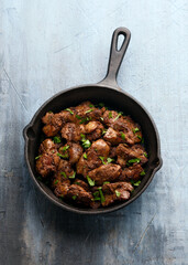 Fried chicken liver, poultry meat food with herbs