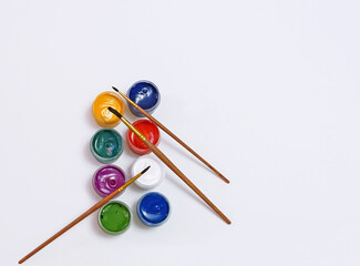 watercolor gouache paints set with brushes.