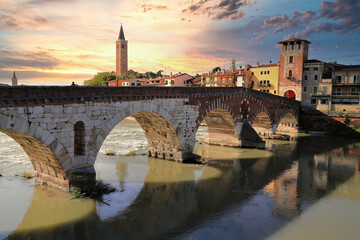 Obraz premium The roman Stone Wall Bridge (Ponte Pietra) over the Adige River. Verona, Italy, Europe.
