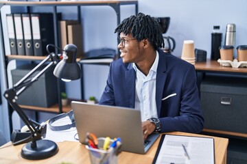 African american man business worker using laptop working at office
