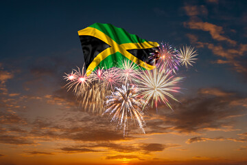 Flag of Jamaica and Holiday fireworks in sky