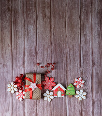 Christmas holiday background. Homemade Christmas cookies and gift box on wooden table. festive winter season. minimal style. top view. copy space