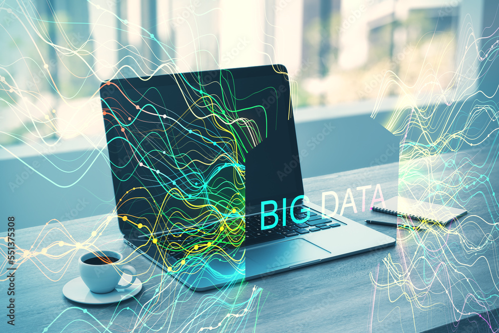 Poster laptop with big data creative colorful lines metaverse hologram, notepad and coffee cup on desktop. 