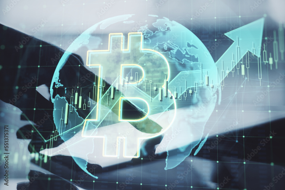 Poster close up of hand pointing at tablet with growing global bitcoin hologram on blurry background. crypt