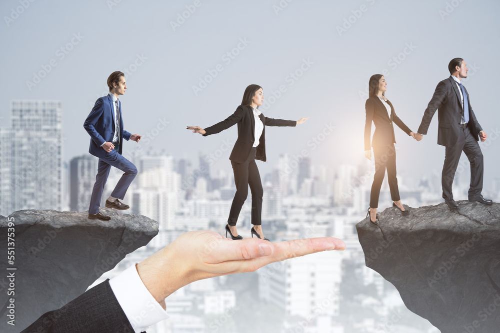 Aufkleber Creative image of team helping each other walk through difficulty on abstract city background with cliff gap. Teamwork, help, success and union concept.