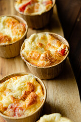 Cheese egg souffle on wooden background