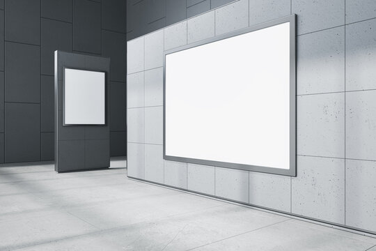 Clean gallery interior with empty white mock up posters on concrete wall. Museum concept. 3D Rendering.
