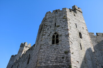 Fototapeta na wymiar Caernarfon Castle in Caernarfon, Wales United Kingdom